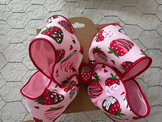 Chocolate covered strawberry bow with strawberry in center