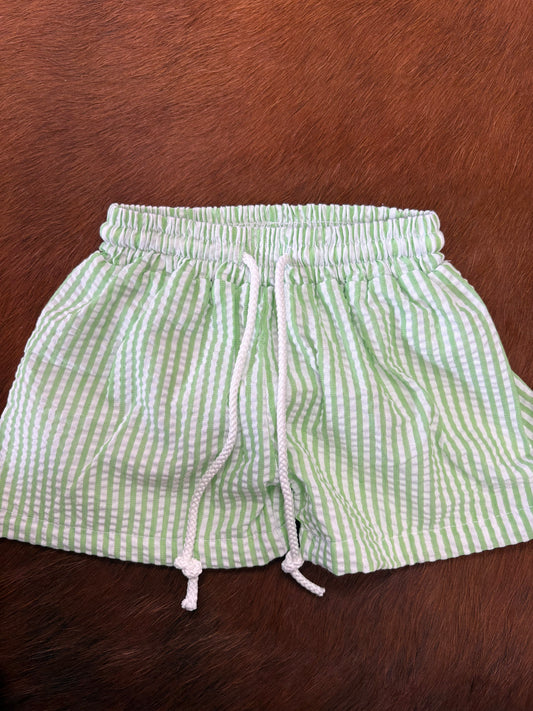 Green bathing suit shorts